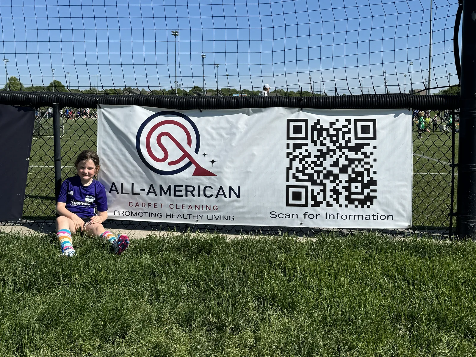 All American banner at a soccer complex